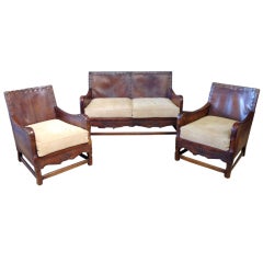 1 sofa & 2   leather club chairs .
