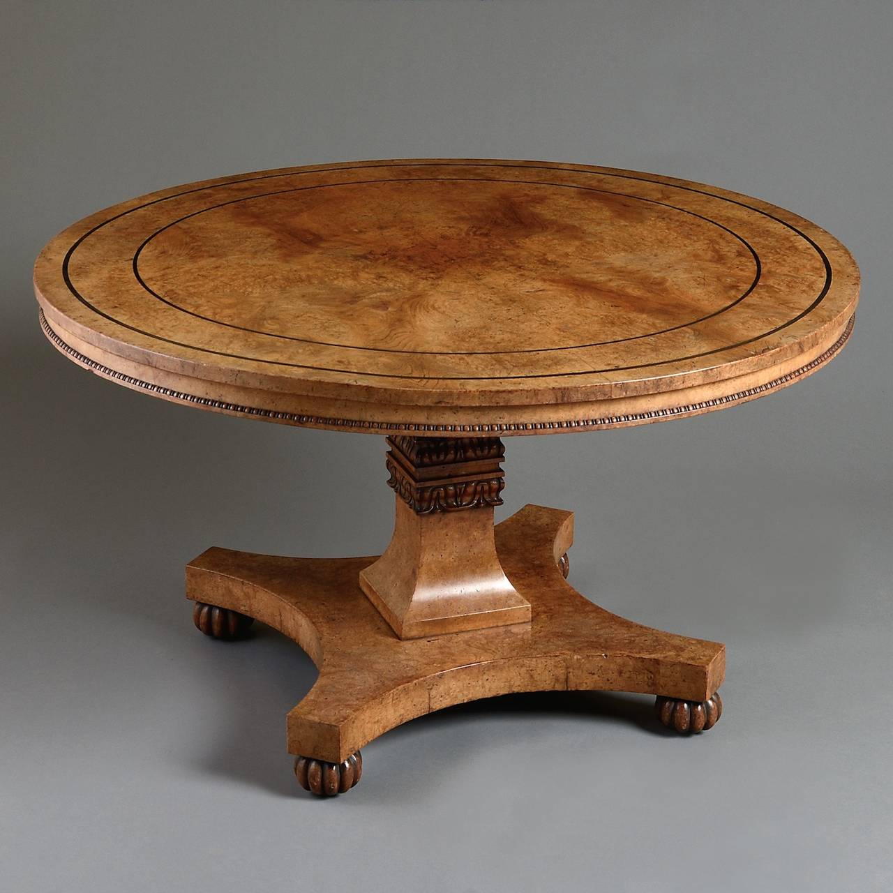A fine Regency ebony inlaid burr elm centre table by William Trotter of Edinburgh, circa 1820.