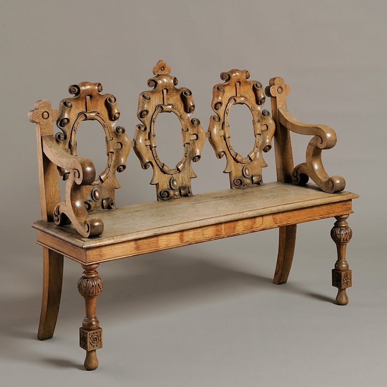 A PAIR OF OAK HALL BENCHES, ALMOST CERTAINLY DESIGNED BY WILLIAM BURN FOR THE MARQUESS OF WESTMINSTER’S FONTHILL ABBEY, CIRCA 1860.
Provenance; The 2nd Marquess of Westminster and thence by descent at Fonthill to Niel Rimington, Esq.
These benches