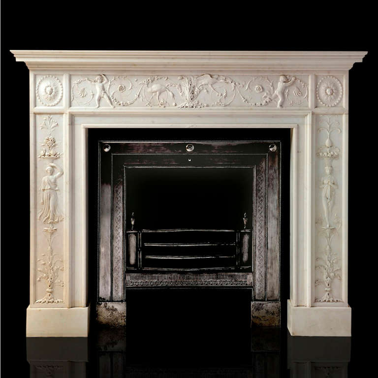 AN EXCEPTIONAL STATUARY MARBLE CHIMNEY-PIECE BY JOHN FLAXMAN R.A. (1755-1826), 1781-2, RIGHT-HAND JAMB, INGROUNDS AND SHELF REPLACED, WITH ITS ORIGINAL ENGRAVED STEEL REGISTER GRATE BY JAMES OLDHAM.
Flaxman’s design for this chimney-piece is in the