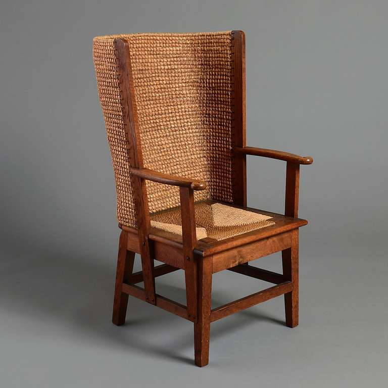 A fine oak and woven barley straw orkney chair by D.M. Kirkness of Kirkwall, circa 1920.