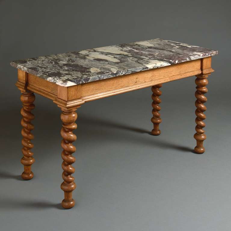 An early Victorian oak side table with fine original breche violette marble top, circa 1840.