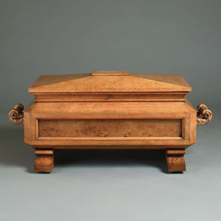 A fine George IV oak and pollard oak sarcophagus wine cooler, circa 1830.