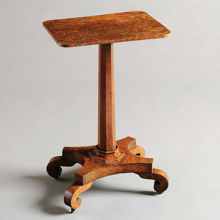 An eccentric George IV Pollard oak lamp-table, circa 1825.