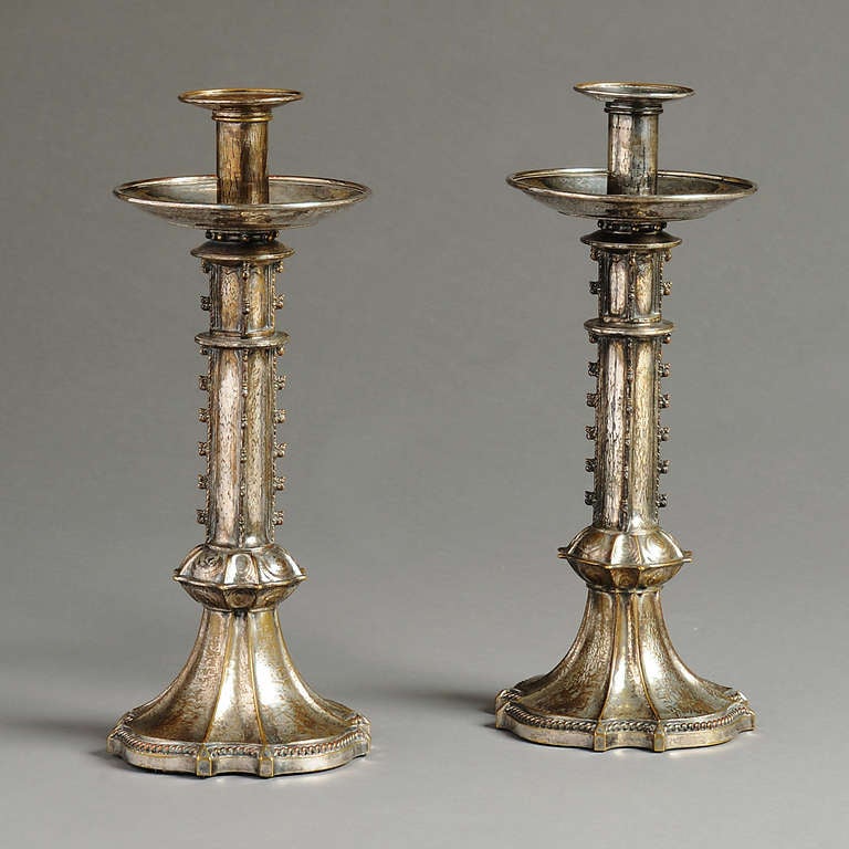 A pair of Sheffield-Plate Candlesticks by Ramsden & Carr, unmarked, circa 1920.