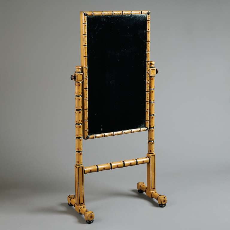 A REGENCY FAUX BAMBOO PAINTED CHEVAL GLASS, ORIGINAL DECORATION, Circa 1810.