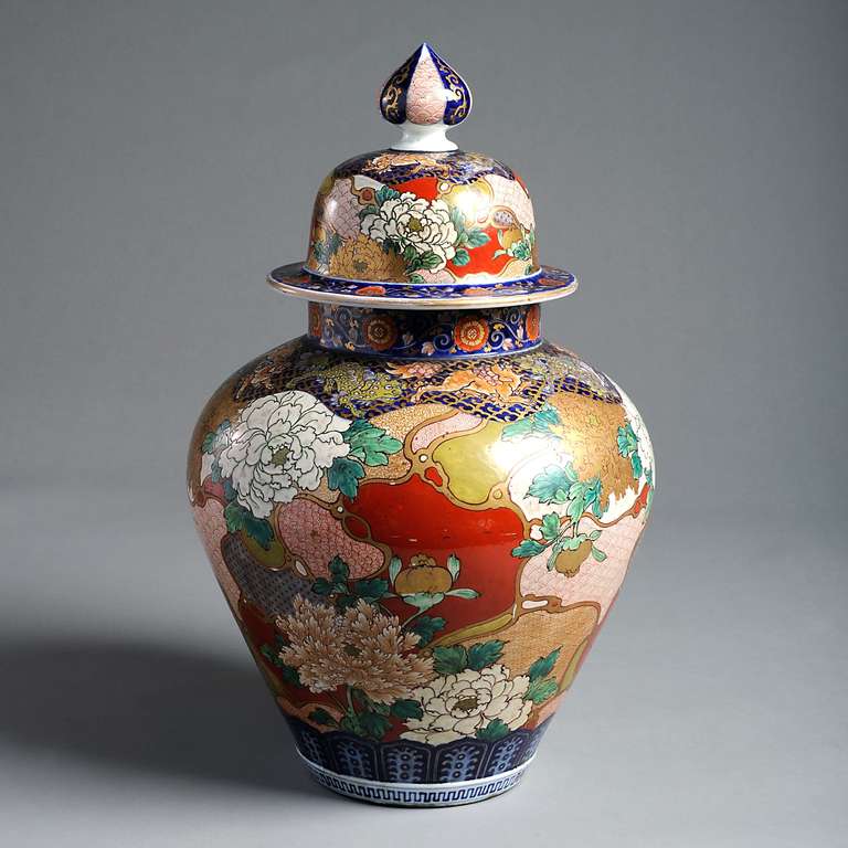 A fine Japanese Meiji period vase decorated in gilt and color with peonies and dragons, circa 1880.