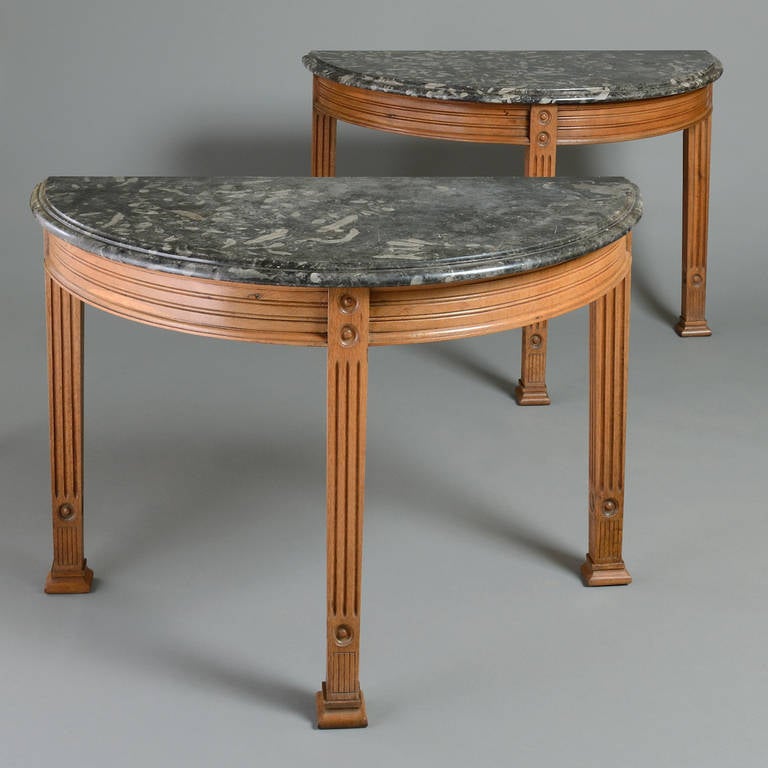 An unusual pair of late Victorian oak side tables with original frosterley fossil marble tops, circa 1880.