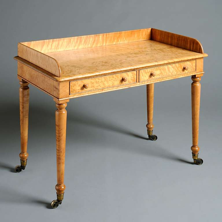 A SCOTTISH EARLY VICTORIAN BURR MAPLE DRESSING TABLE, Circa 1840.