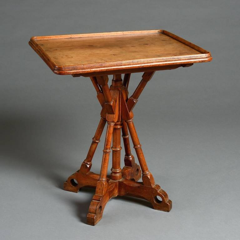 an unusual cedar lamp table in the manner of A.W.N. Pupin, circa 1850.