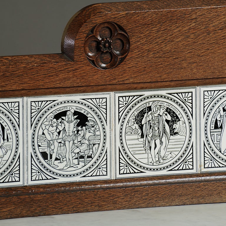 A FINE VICTORIAN GOTHIC OAK WASHSTAND ATTRIBUTED TO CRACE & CO. INSET WITH MINTON SHAKESPEAREAN TILES, CIRCA 1870.

Provenance: Ayton Castle, Berwickshire, Scotland.