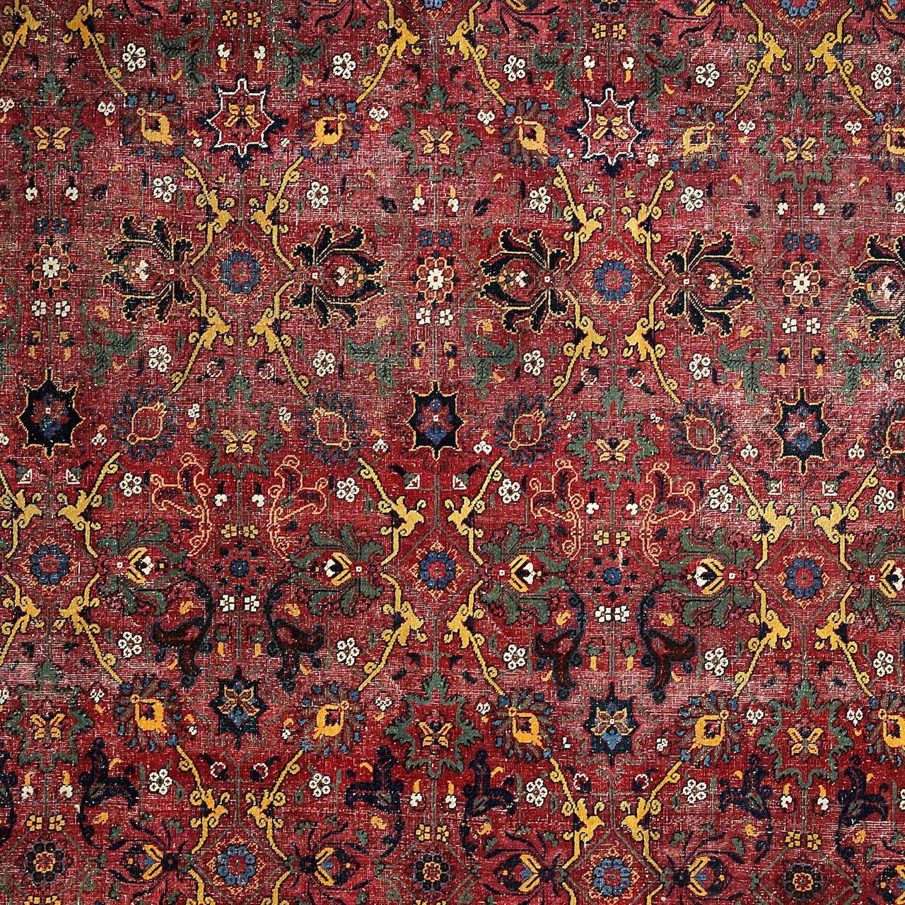 A fine and rare large Mughal carpet, first half of the 18th century.