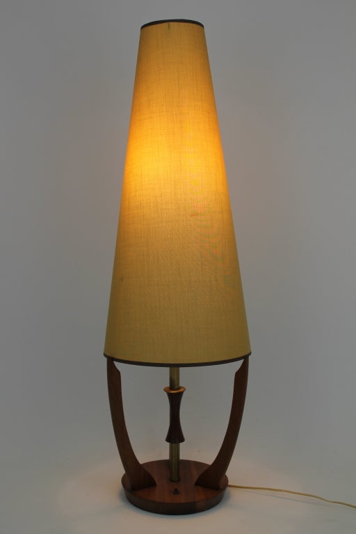 This teak table lamp with cone shaped shade is a great example of mid century danish design.
