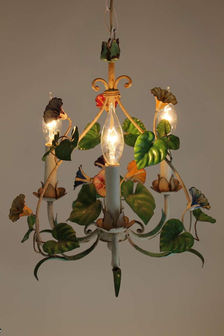 Vintage European Tole Chandelier with Floral Motif. The patina adds to the charm of this piece.