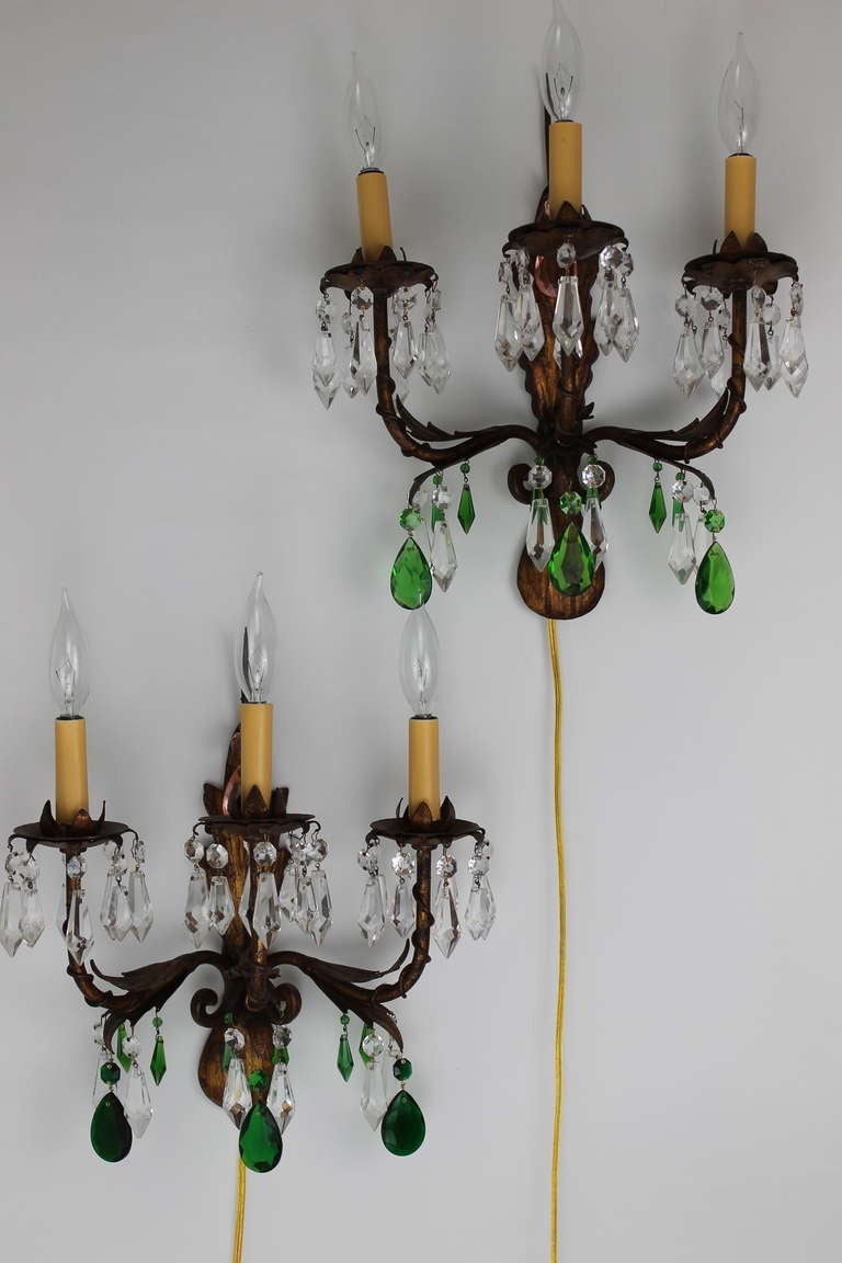 Gilt Italian Tole Sconces with green, clear and pink prisms. Can be wired into junction boxes or used with cord as shown.