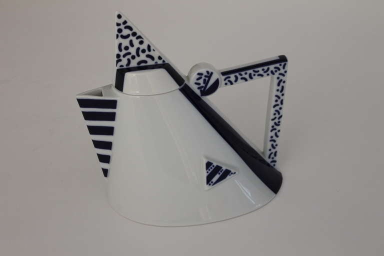 Memphis Era Teapot by Kato Kogei for Studio 99 Delta Japan. A nod to traditional porcelain with blue painted under-glaze, this teapot is anything but traditional. Whimsical shapes and motifs of the Memphis Group inspired the work of Japanese artist,