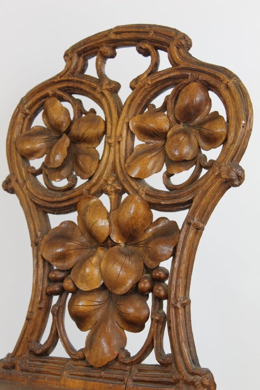 Pair of Carved German Black Forest Chestnut Hallway Chairs 1