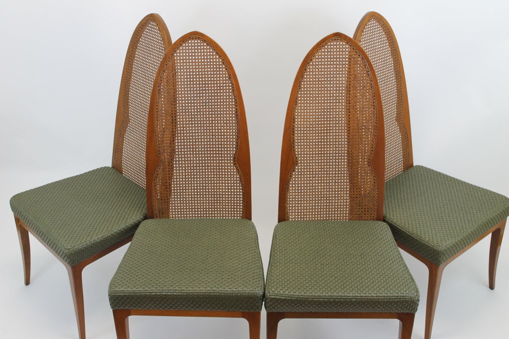 These chairs are classic Probber; cathedral style, signature saber leg and impeccable quality. Price is for set of four chairs. 
