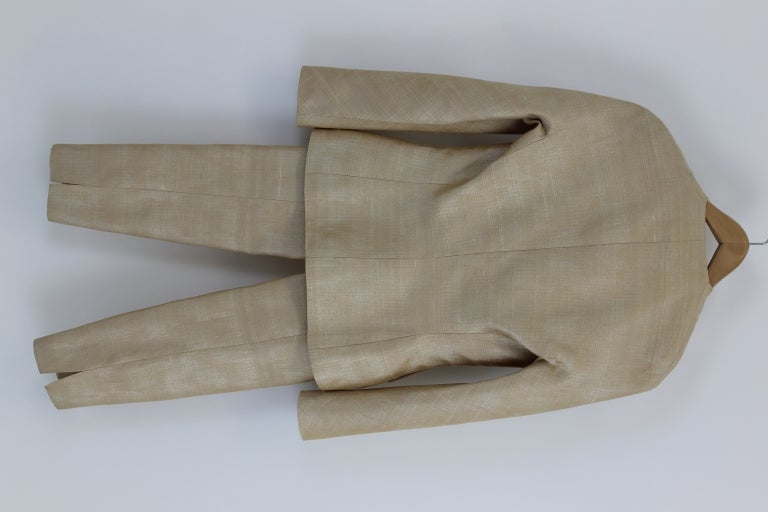 Silk pantsuit altered to fit Brooke Astor. The jacket has lovely shell buttons and Moroccan detailed pockets. Snap closures keep the jacket line while sitting. The size has been removed but the jacket fits about a size 4 and the pant fits a size 2.