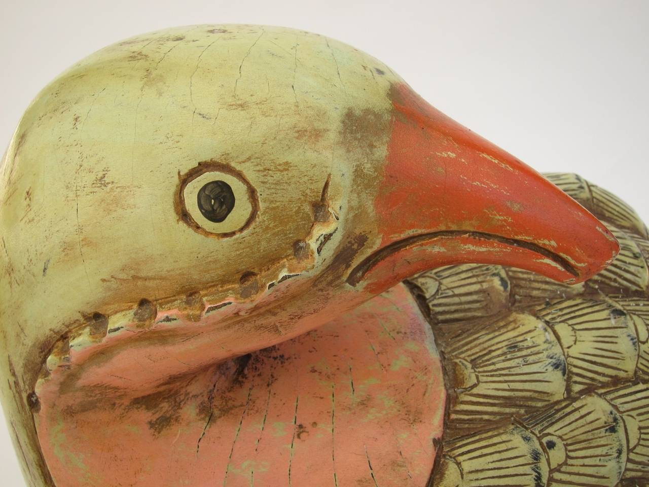 Large carved and painted wooden bird sculpture. Hand painted and carved on solid wood.