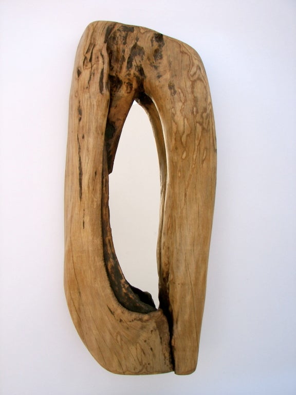 Free-form wood mirror made from a oak tree stump. One side has a rosewood butterfly