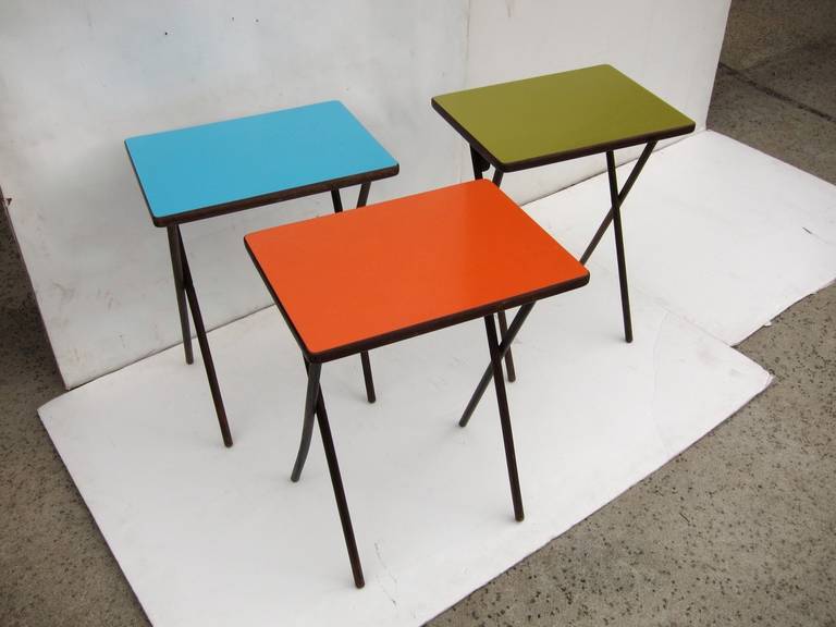 Set of three 1950s folding tray tables.