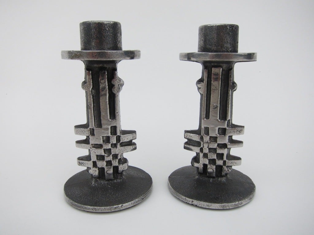Norwegian Cast Stainless Steel Candle holders by Olav Joff. Textured and relief moulding. Signed