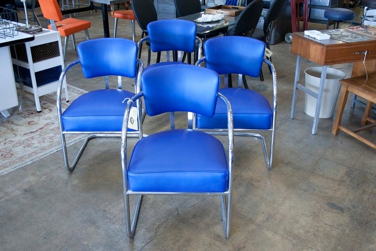 Vintage Chrome Craft Dining Chairs with Blue Vinyl.
New upholstery  with signs of minor wear on legs.
There are only 2 out of 4 left.