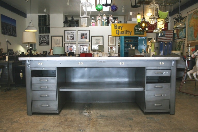 Stainless steel top with a protective clear coat finish on the natural steel body.