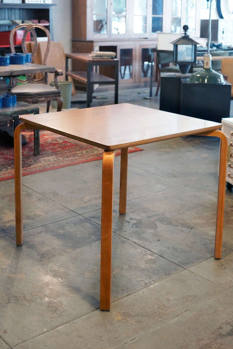 This is a rare table by Thonet, featuring the iconic 