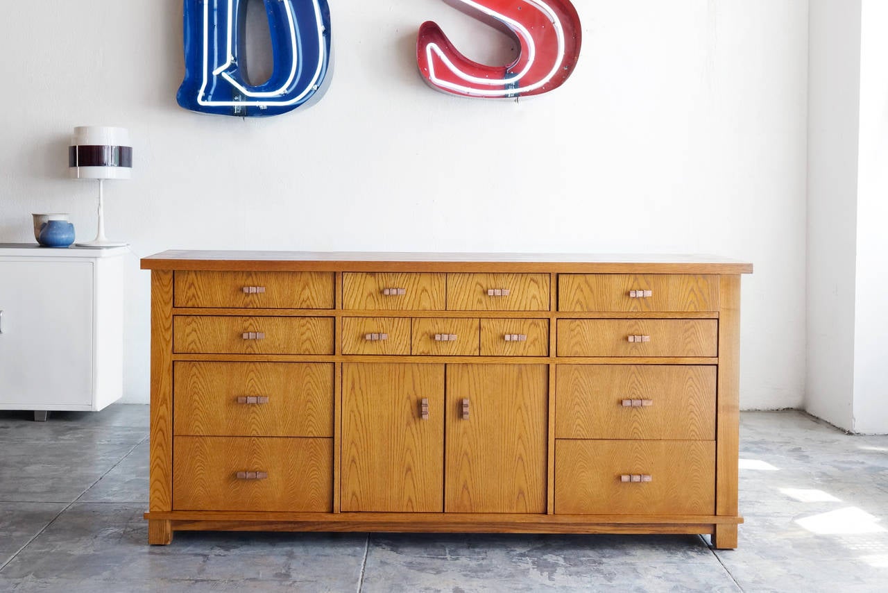 Limited edition vintage oak sideboard by acclaimed lighting designer Robert Sonneman. Sonneman created this piece for his Urban Primitive collection, a line of furniture rooted in the Mission Style. Manufactured by Stanley Furniture. Commissioned by