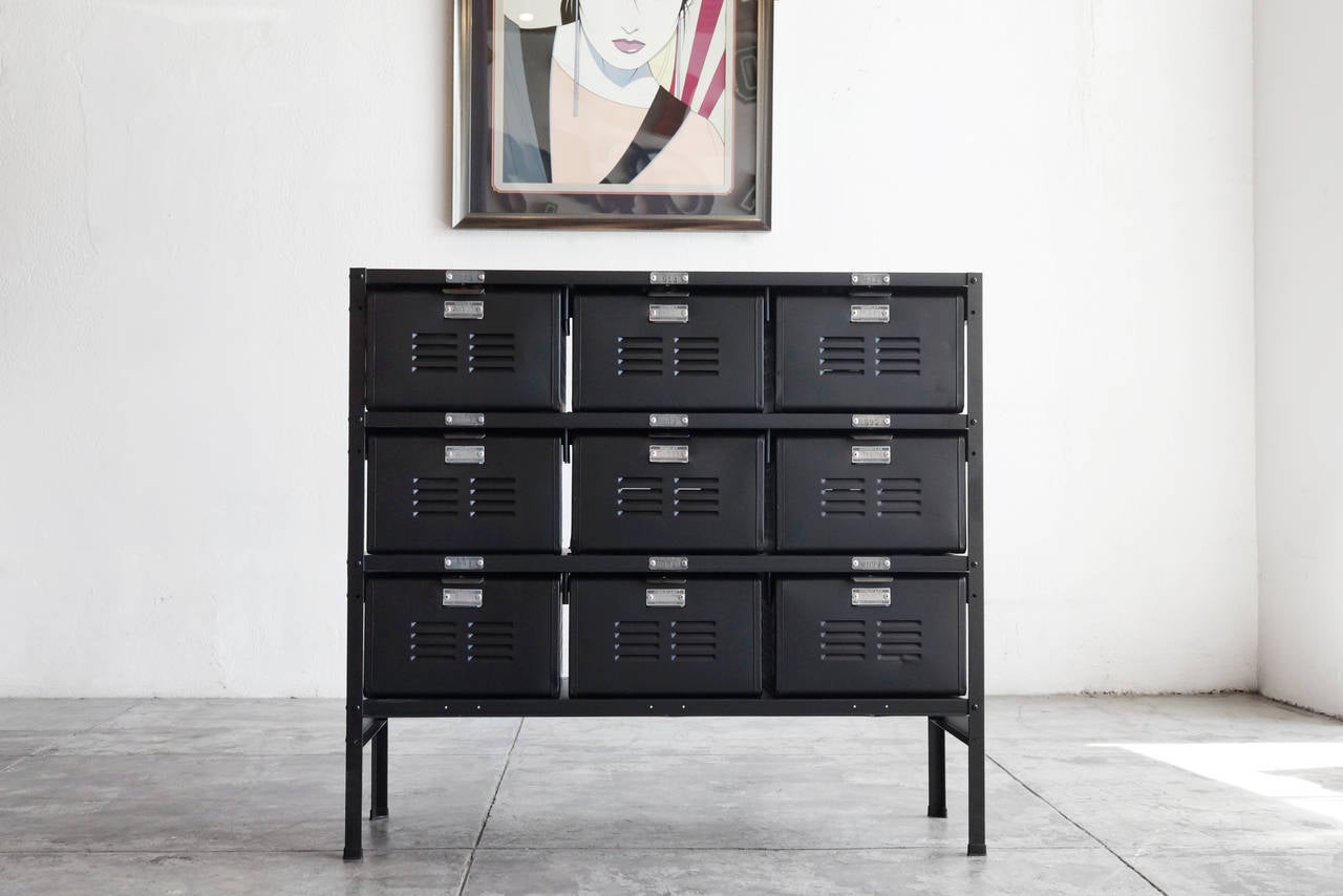 Our vintage locker basket units are composed of Mid-Century, all-American locker bins in a vintage steel frame, with a refinished powder-coat. Featured here is a 3 x 3 unit refinished in a matte black powder coat. All original hardware,