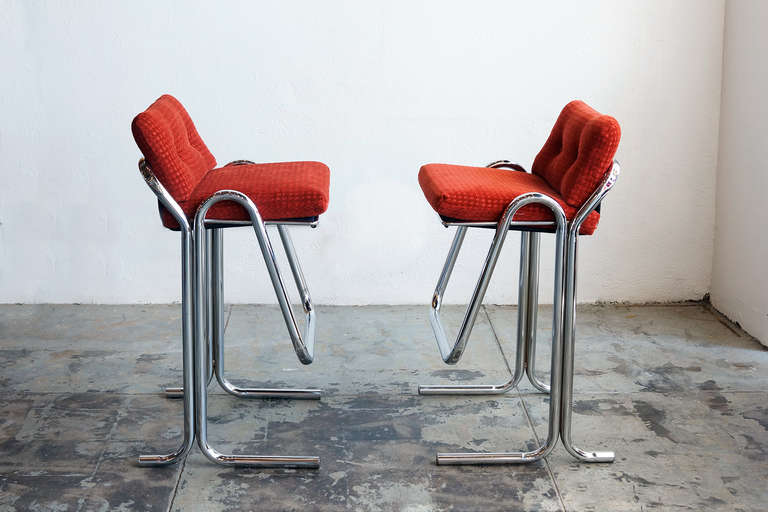 Vintage tubular chrome bar stools designed by Jerry Johnson, with plush, newly upholstered chenille seat cushions. Totally chic, circa 1960s.