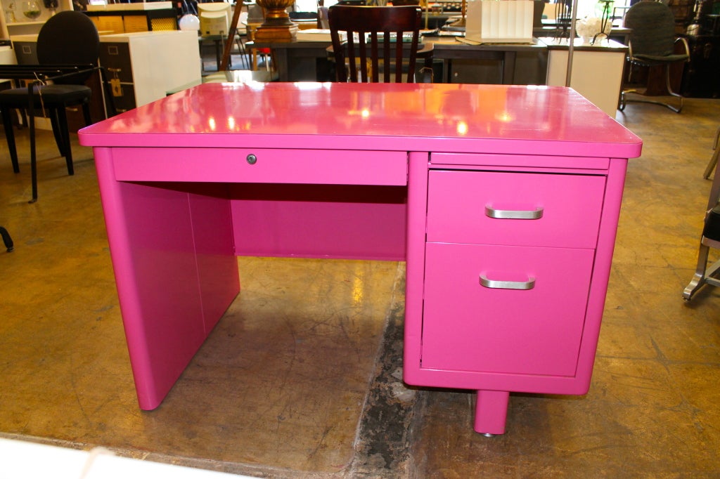 Spice up your office with this vibrant pink tanker desk!