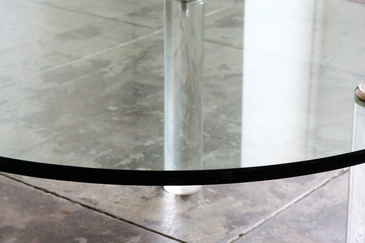Sleek acrylic, glass and chrome coffee table, circa 1970s, by Leon Rosen for Pace. A Classic Rosen design showcasing his minimalist aesthetic and unique combination of materials. Overall in excellent condition with gentle scuffing to glass and light