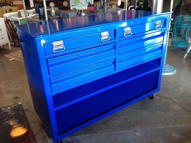 This is a great industrial sized storage cabinet with 6 drawers and a handy shelf . Large castors make it easy to move.  Refurbished in a beautiful gloss blue powder coat finish.