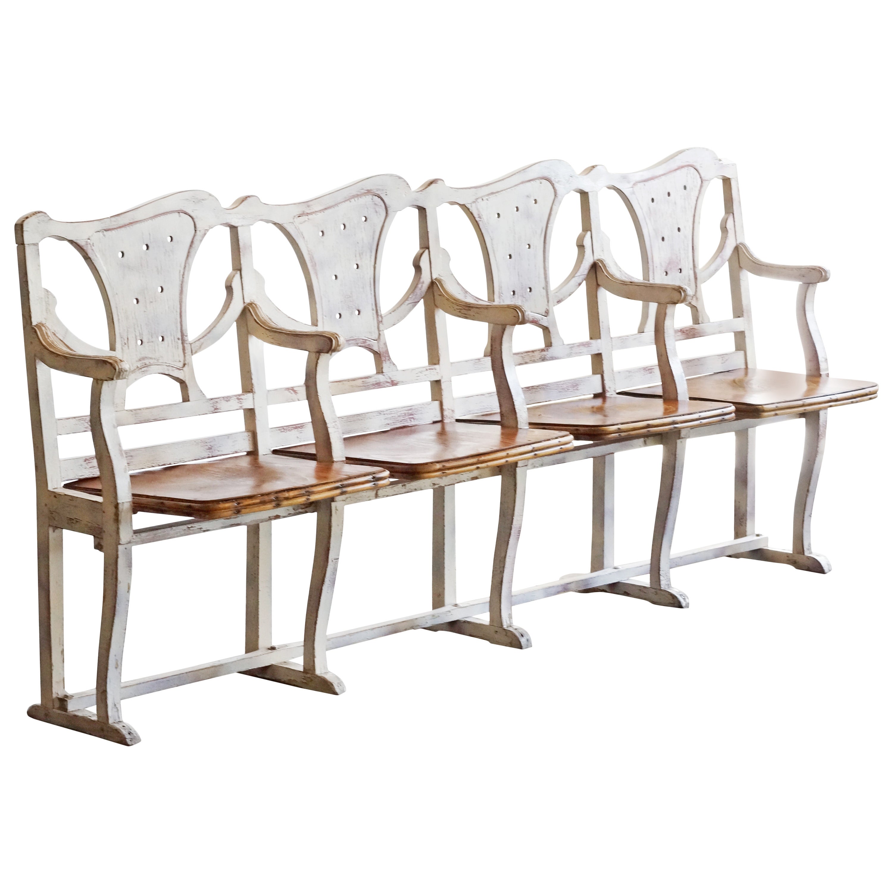 Antique Cottage-Style Row of Theater Seats with Crest Design