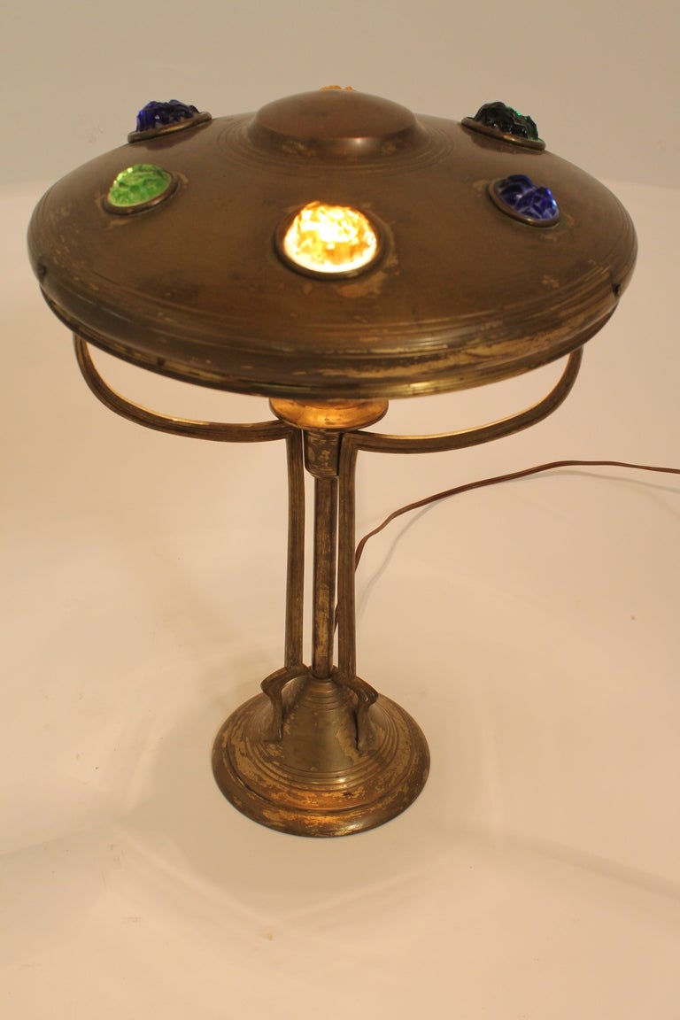 Wonderful Art Nouveau Brass Lamp with elegant lines and a shade that features faceted glass jewels that shine when the lamp is lit.
