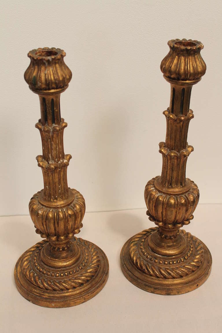 Pair of Italian Carved and Gilt Wood Candle Stands