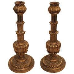 Pair of Italian Carved and Gilt Wood Candle Stands