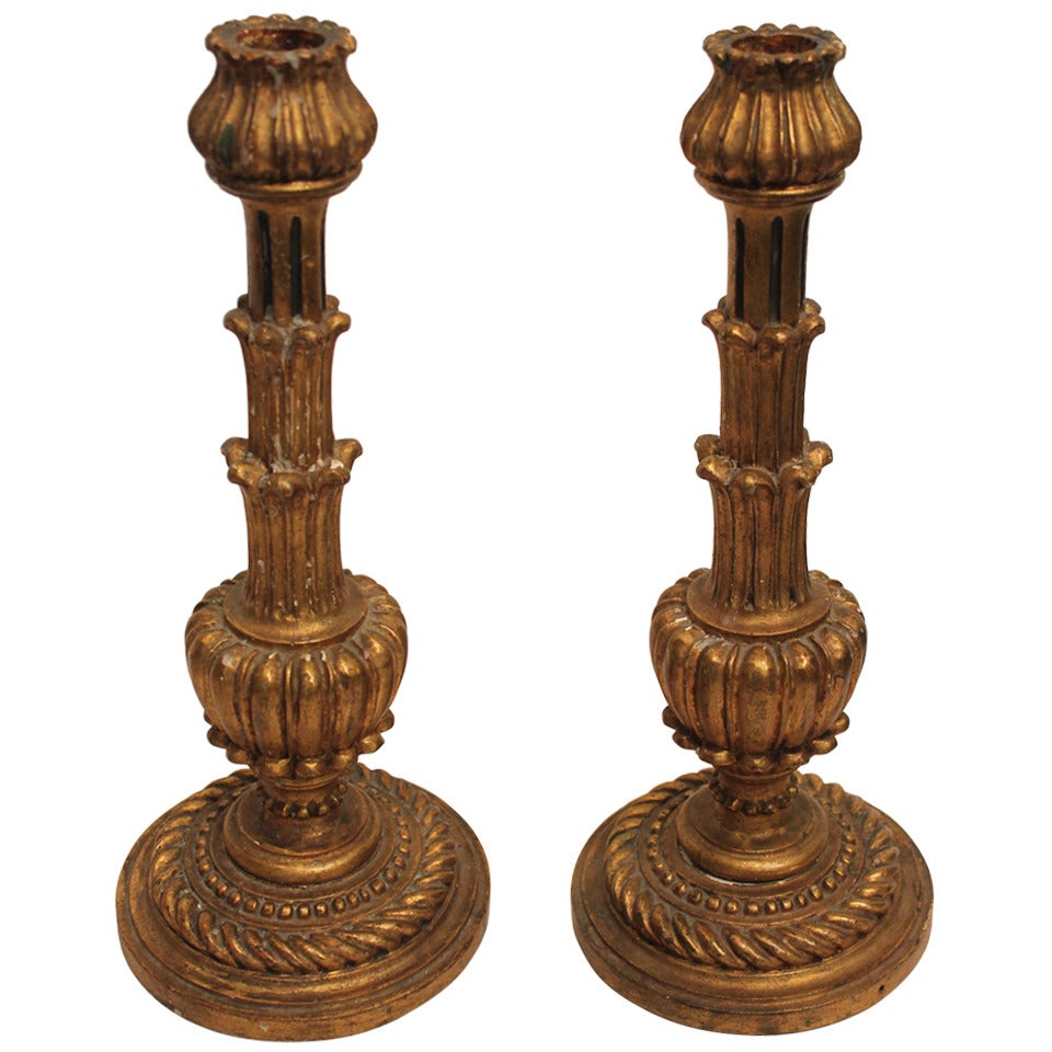 Pair of Italian Carved and Gilt Wood Candle Stands For Sale