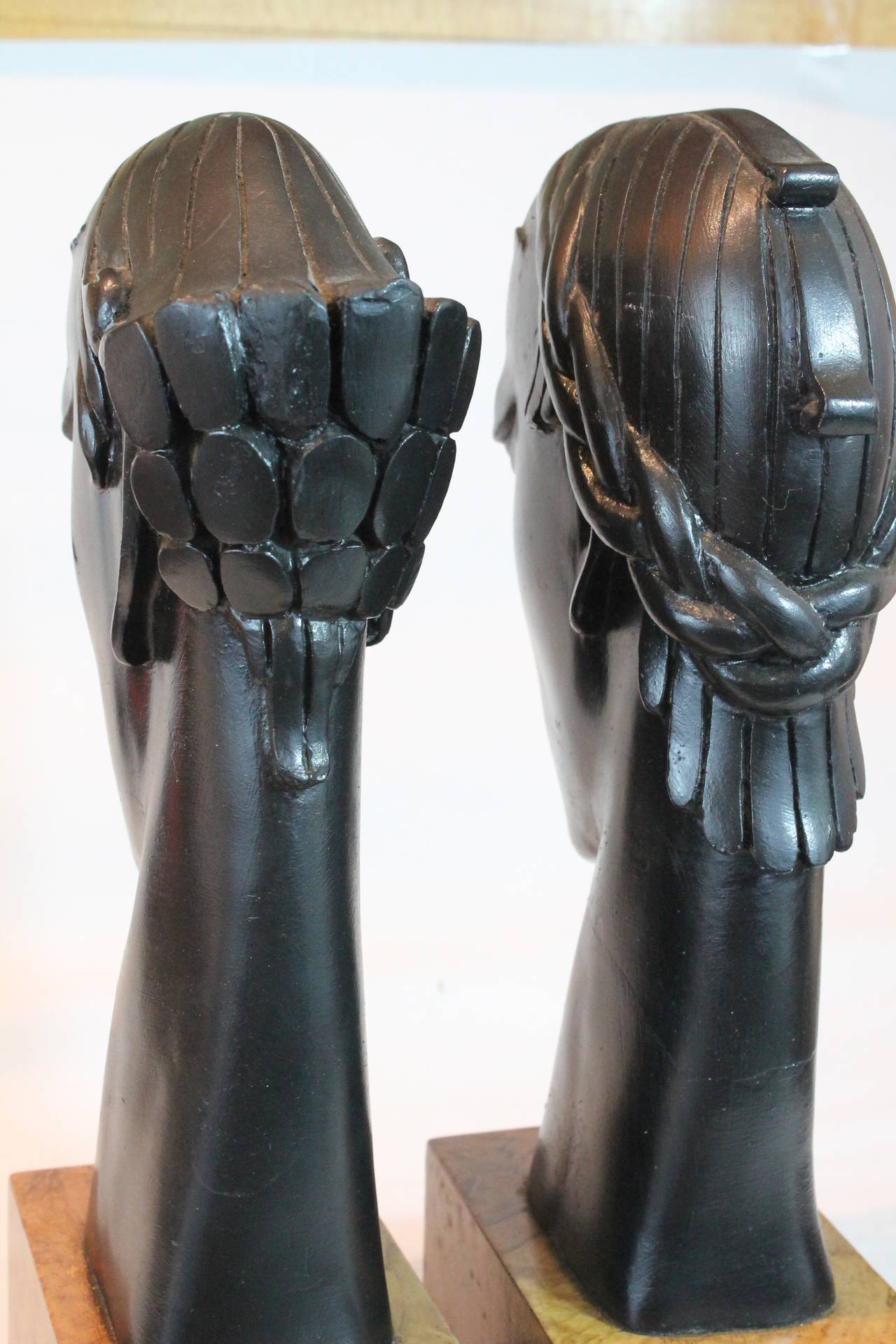 Pair of Art Deco Carved and Ebonized Head Bookends 1