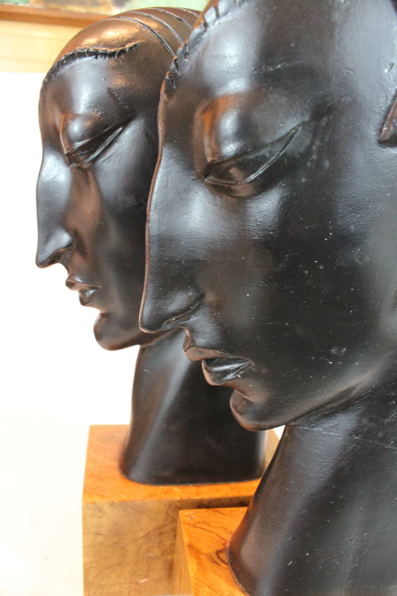 Pair of Art Deco Carved and Ebonized Head Bookends 4