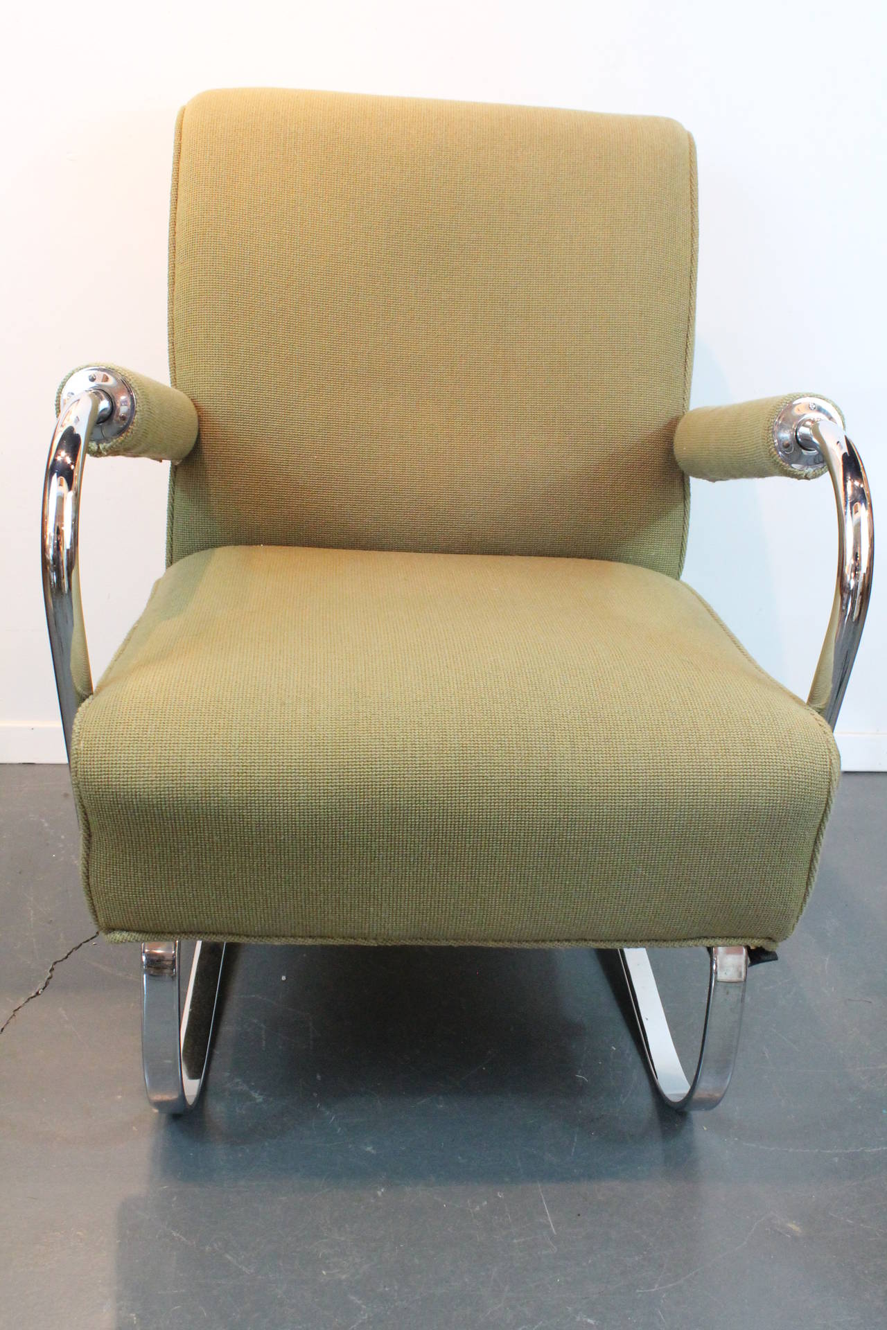 Very comfortable Art Deco chairs in the style designed by KEM Weber manufactured by Lloyd.
 Flat band chrome base that springs with the tootsie roll upholstered arms.
There are 3 available and the matching sofa.