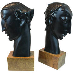 Pair of Art Deco Carved and Ebonized Head Bookends