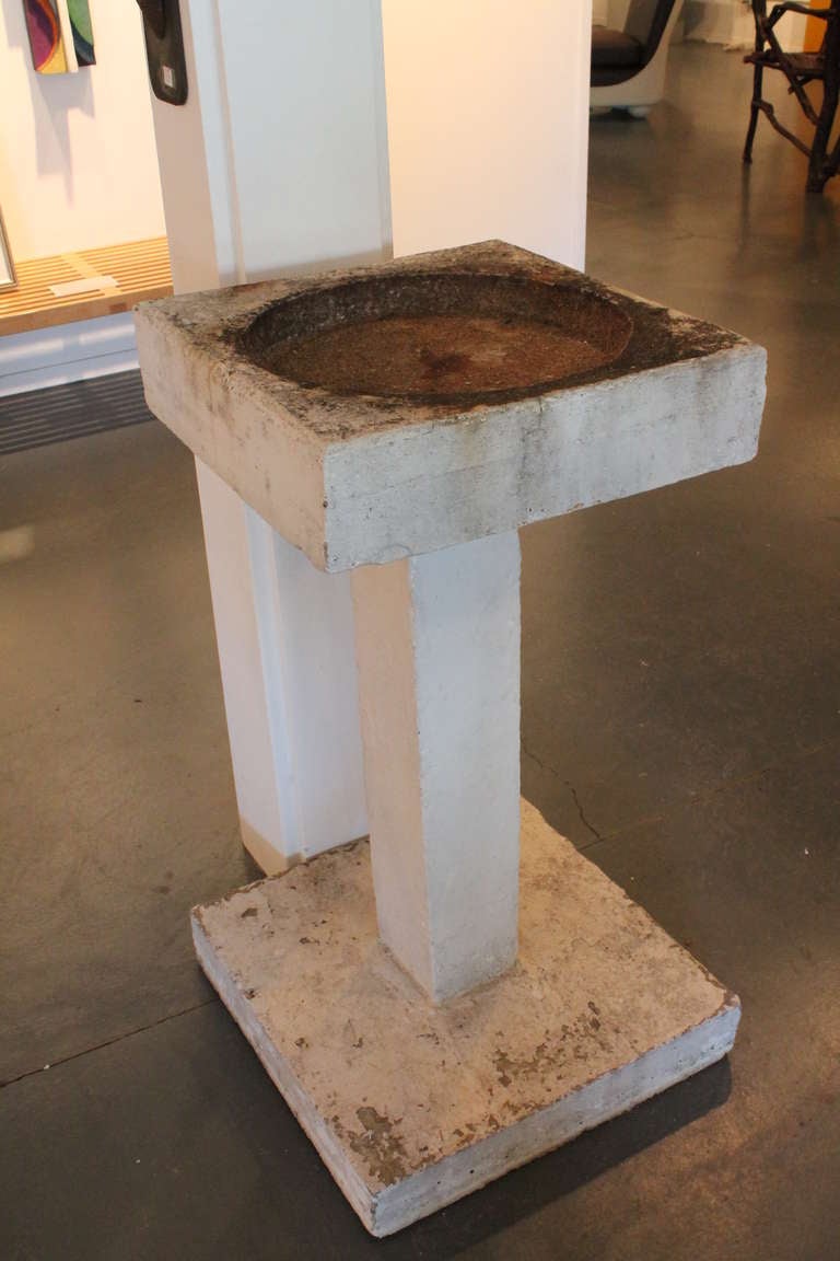 Wonderful wear and surface on this 1940's -50's concrete birdbath .
Excellent proportion and sculptural minimalist form.
One piece of concrete.