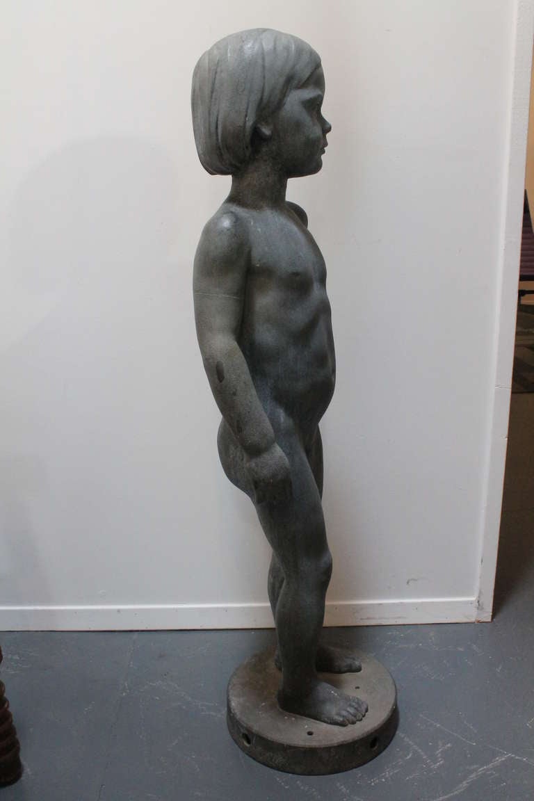 Wonderfully evocative and delicately rendered zinc sculpture of a life sized nude child.
Likely a commissioned piece for a garden , but would be fantastic inside as well.
Signed L E on base.