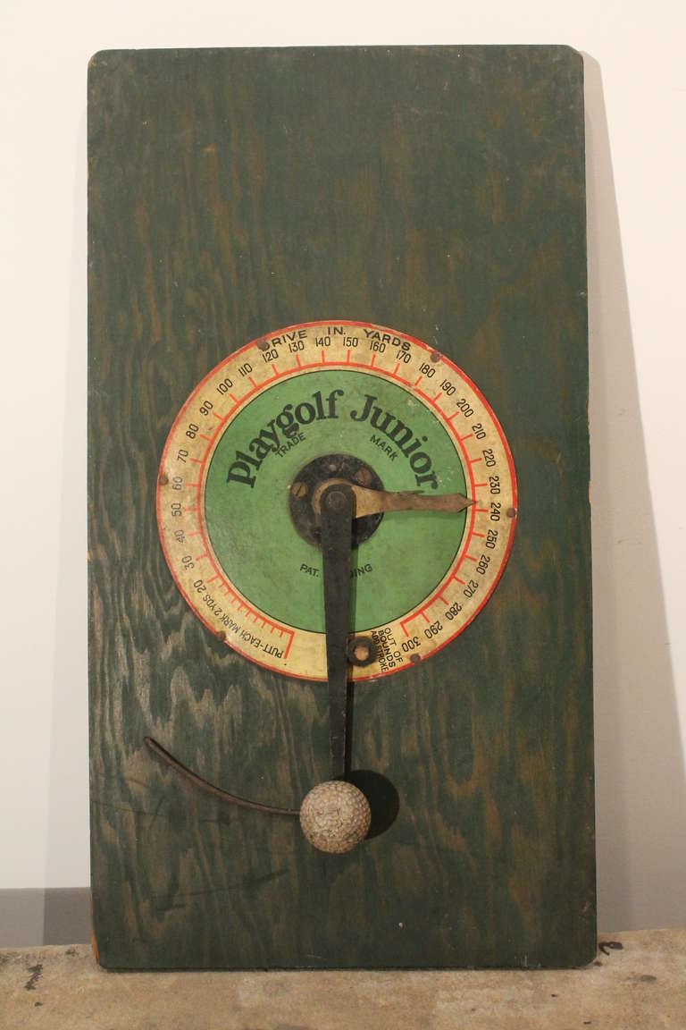 Graphic game board that would estimate the strength of your drives in yards.
The board was laid on the ground and the ball was struck. The gauge would spin with the ball to show you how far an actual ball would have traveled.