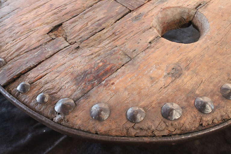 Ancient Hand-Forged Iron and Wood Wagon Wheel Cocktail Table In Excellent Condition For Sale In 3 Oaks, MI