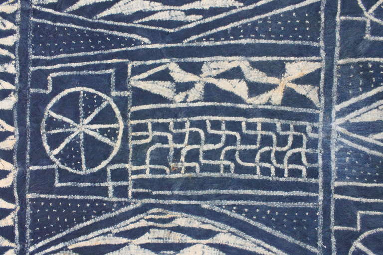 Exceptional design on this woven cotton and indigo dyed Bamileke textile from the grasslands of Cameroon.
This example is large at over 10ft. , and is similar to one in the collection of the Metropolitan Museum of Art.
They were used as clothing